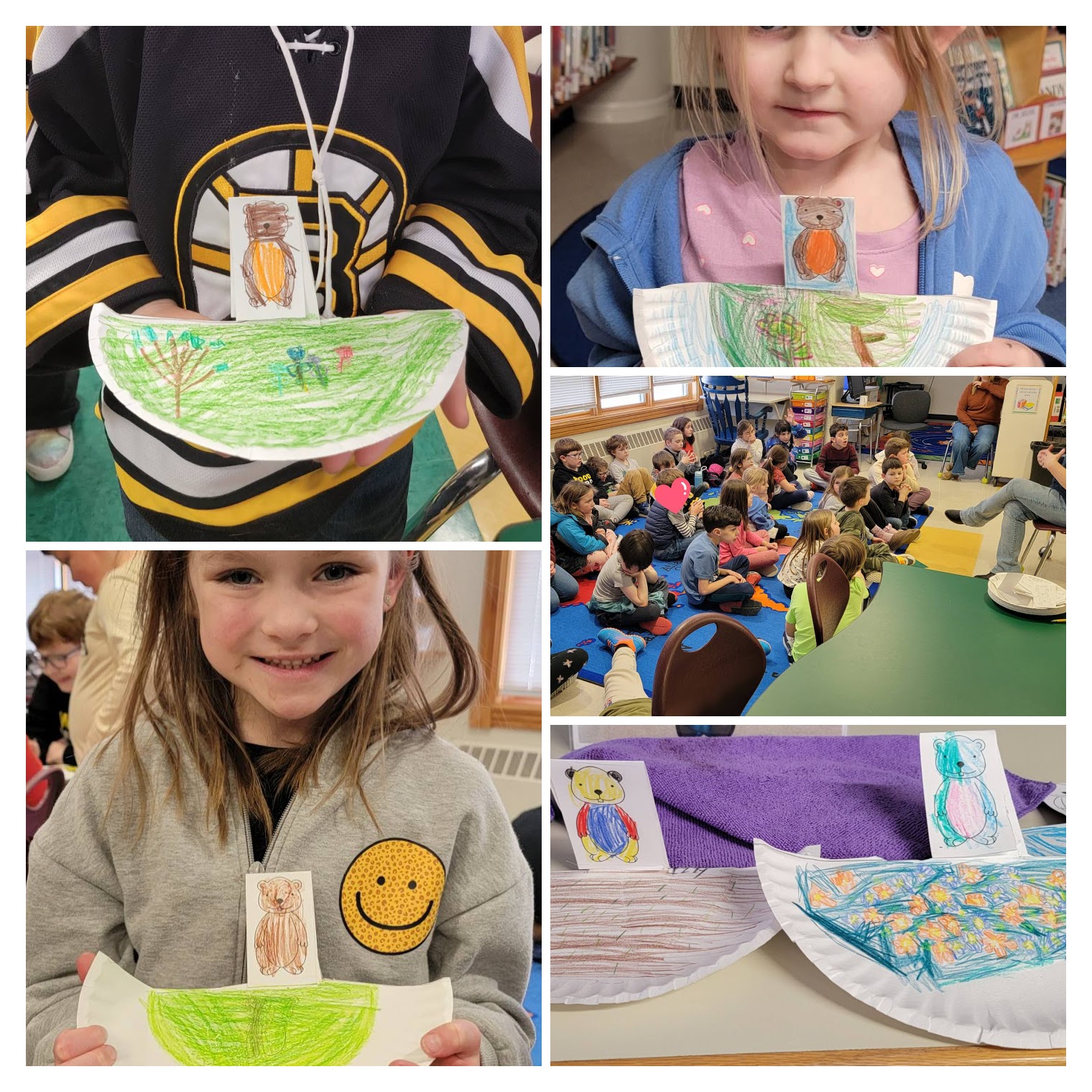 students showing artwork